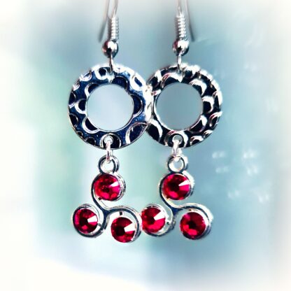 Steampunk BDSM jewelry symbol triskele emblem earrings submissive dominatrix clothing