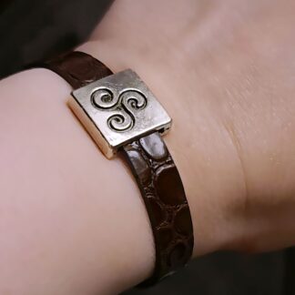 mens bracelet with triskele sub dom symbol triskelion