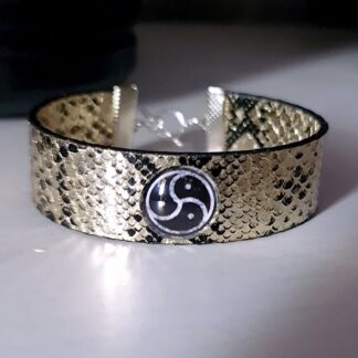 Steampunk BDSM jewelry bracelet with triskele