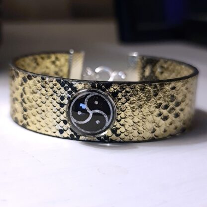 Steampunk BDSM jewelry bracelet with triskele