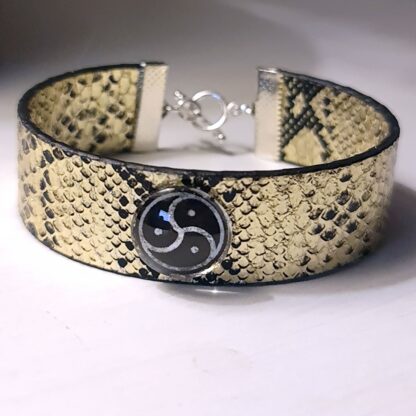 Steampunk BDSM jewelry bracelet with triskele